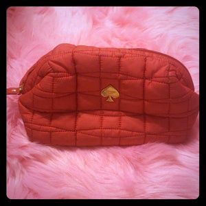 Red Kate spade cosmetic case
